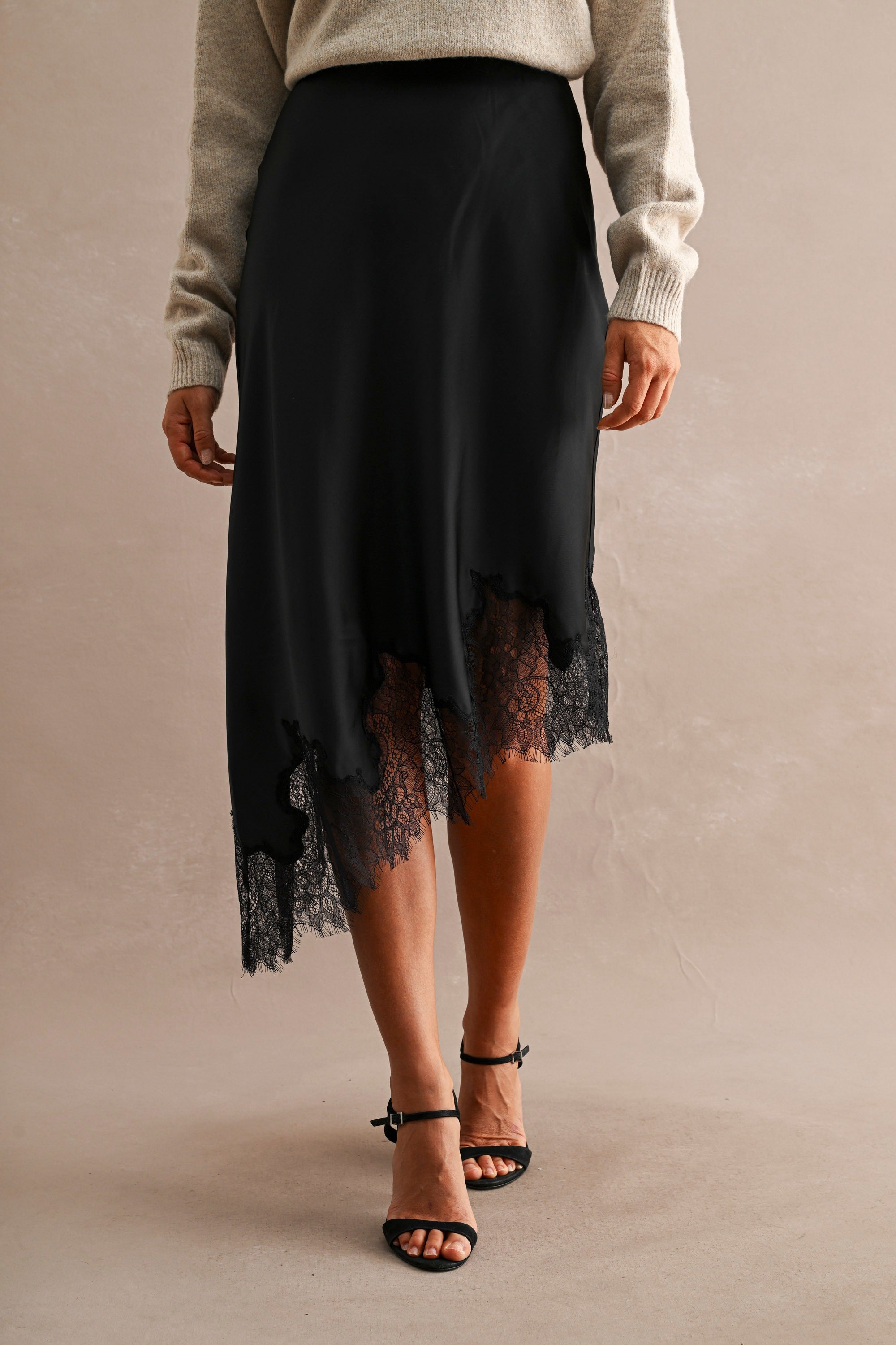 Black Satin Asymmetric Hem Lace Trim Midi Skirt — Black