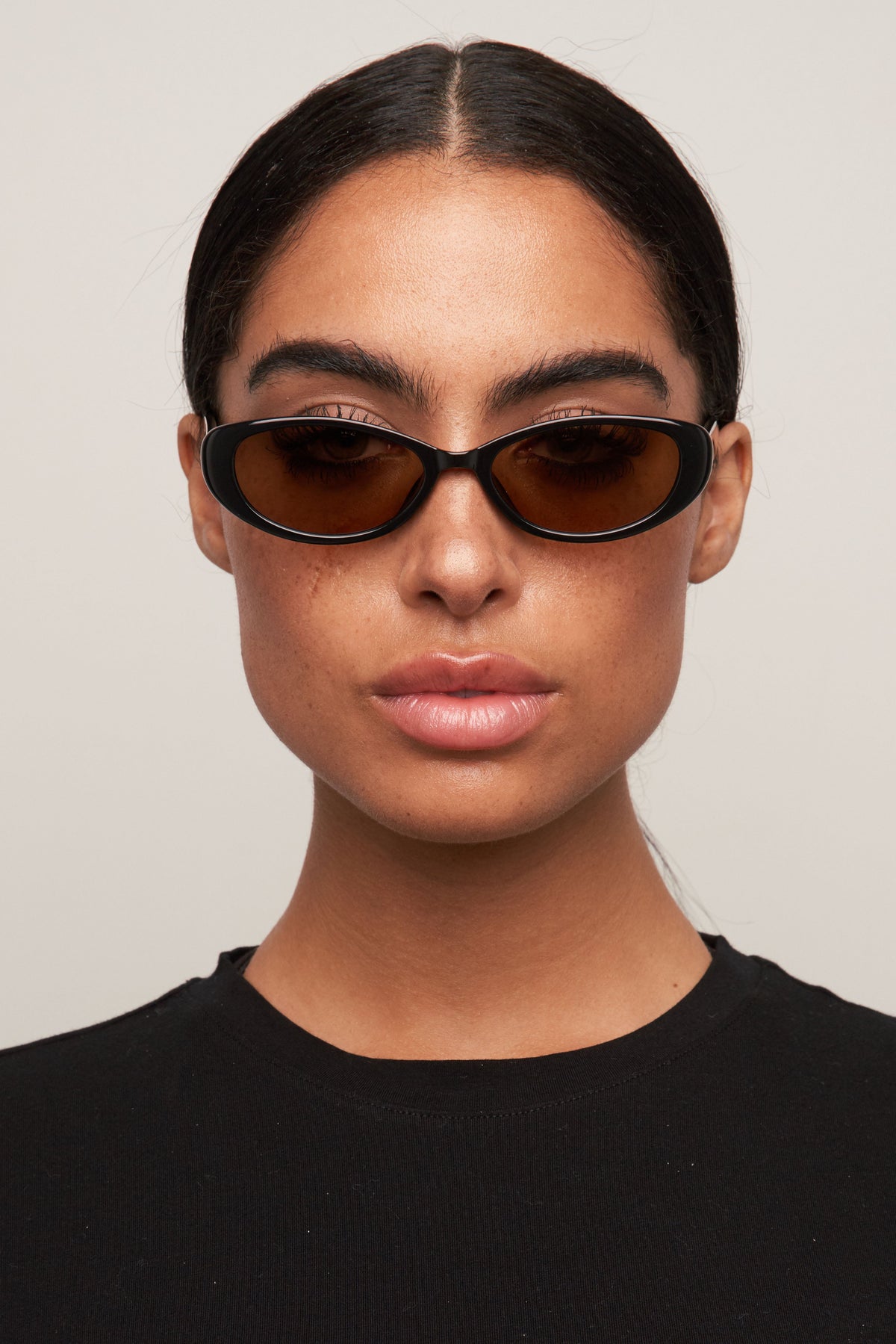 Model wearing Cami cat-eye sunglasses