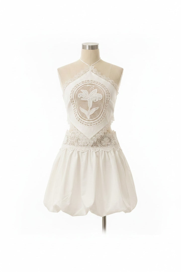 ISSUE 92 Retro Set white polyester halter top with lace trim and floral embroidery, paired with a bubble skirt.
