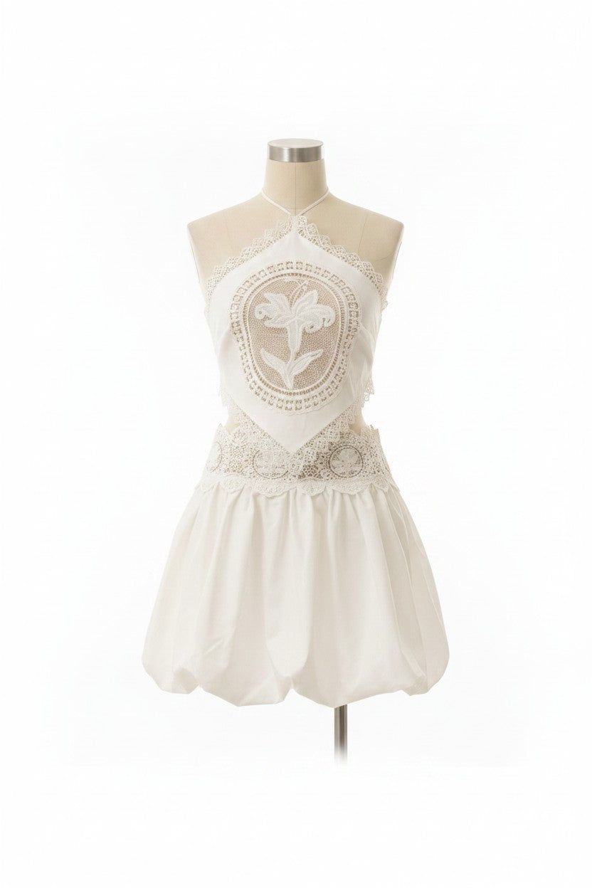 ISSUE 92 Retro Set white polyester halter top with lace trim and floral embroidery, paired with a bubble skirt.