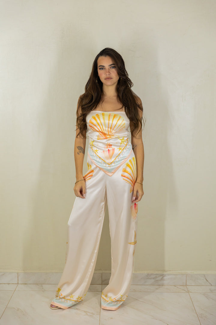 ISSUE 92 Shell Set featuring a cream polyester camisole and wide-leg trousers with orange and yellow seashell print.