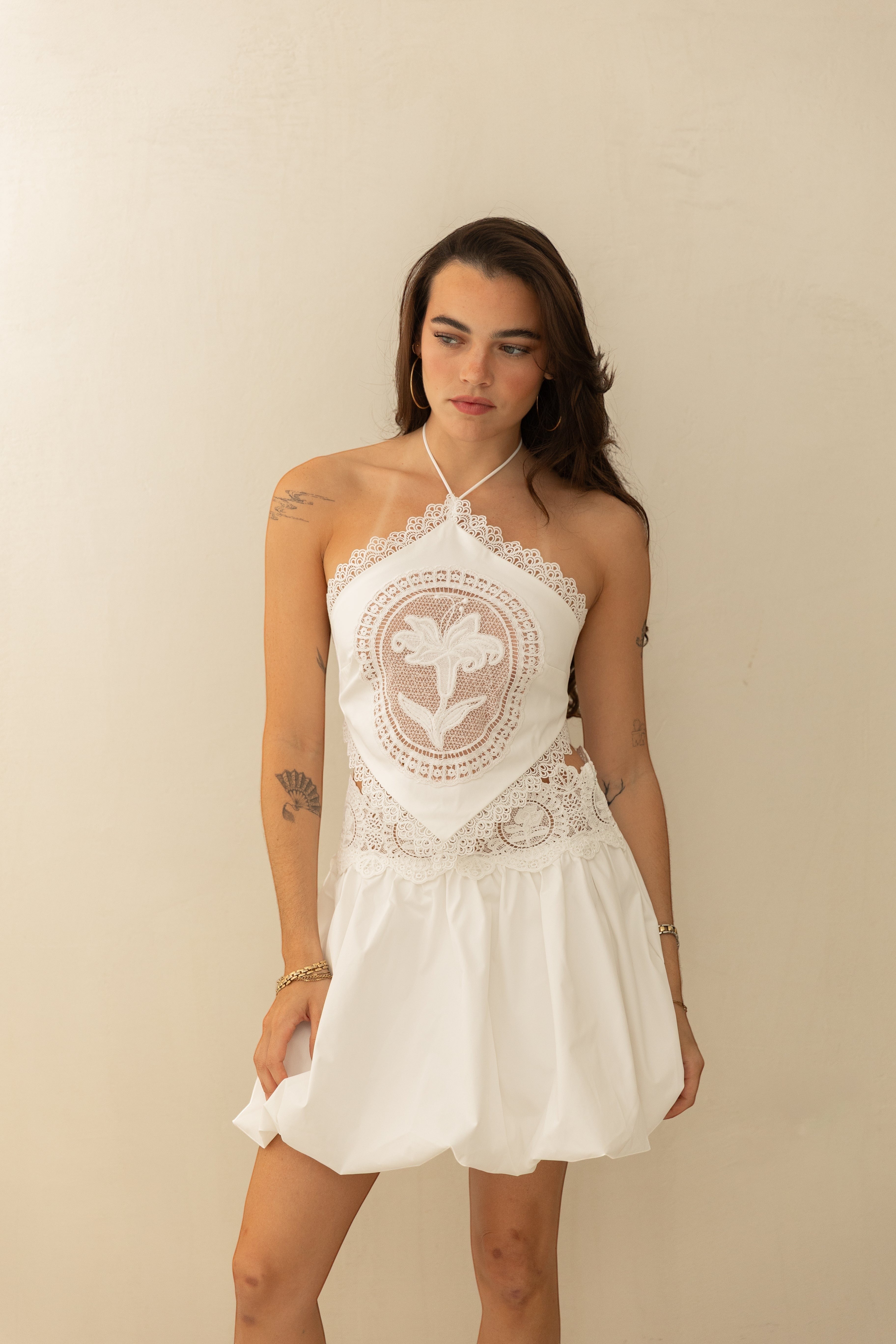 ISSUE 92 white polyester retro set with lace trim and floral embroidery on halter top and bubble skirt.