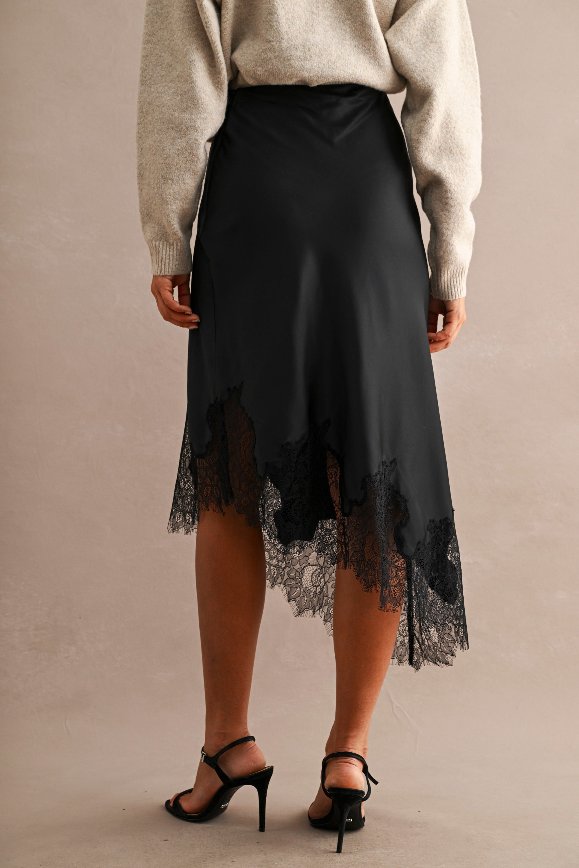 Black Satin Asymmetric Hem Lace Trim Midi Skirt — Black